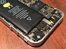 iPhone being repaired for a cracked screen